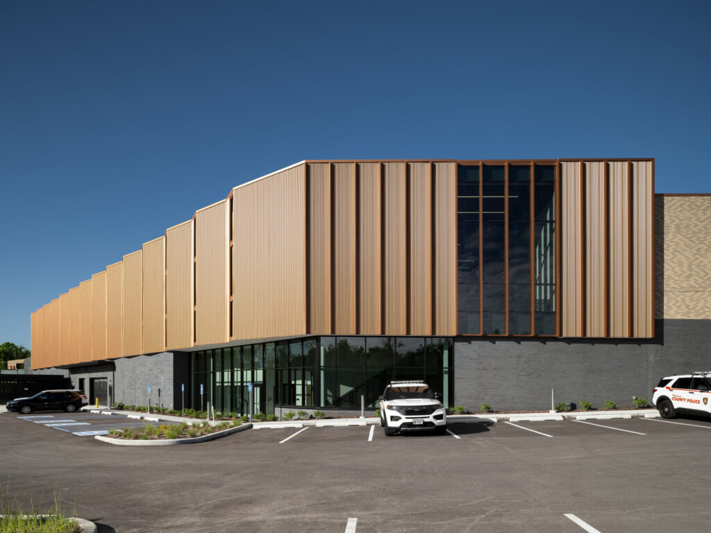 Exterior view of the St. Louis County Precinct 2 back, showcasing the copper panels and curtain wall