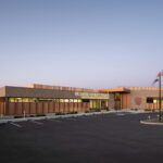 Exterior view of the St. Louis County Precinct 2 building front at dusk