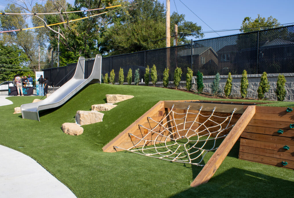 Urban Sprouts new playground space includes a climbing web and slide